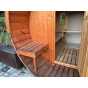 Venkovní sedačka u sauny