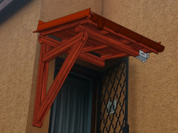 Detail kotvení vchodové stříšky do zdi domu
